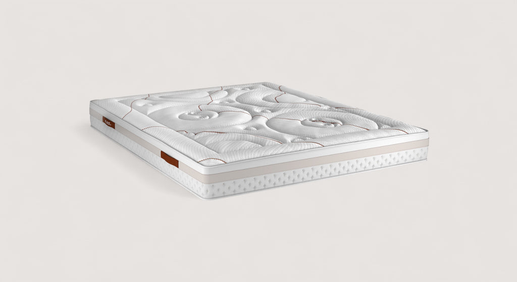 Packshot d'un matelas Nuage avec motifs floraux en relief, bordure beige et poignée rouge