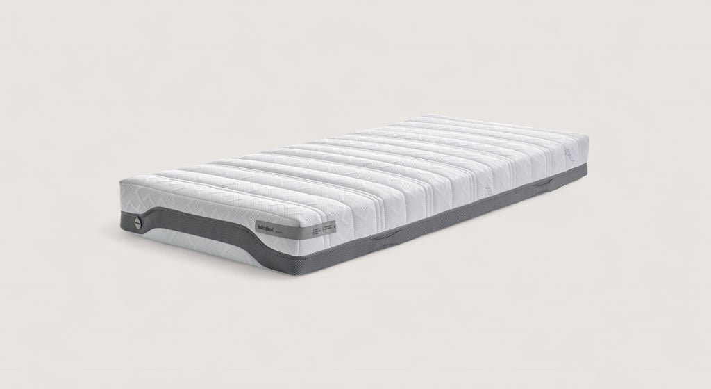 Matelas Lattoflex Zen Plus avec design ergonomique et revêtement blanc texturé, présenté en packshot sur fond neutre