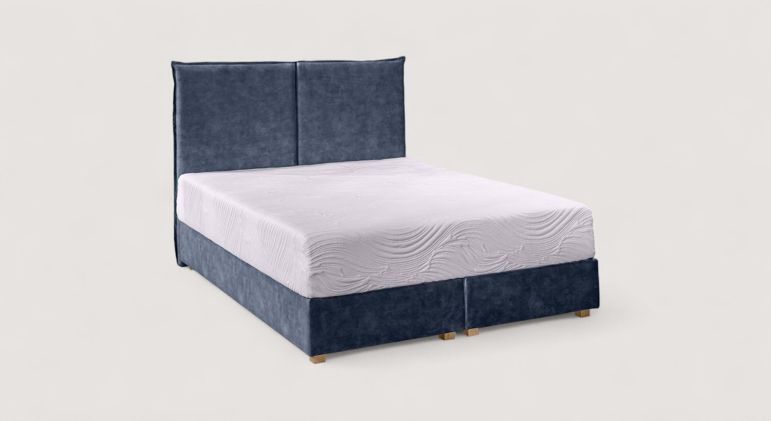 Matelas sur un lit avec tête de lit en tissu bleu, design élégant et moderne