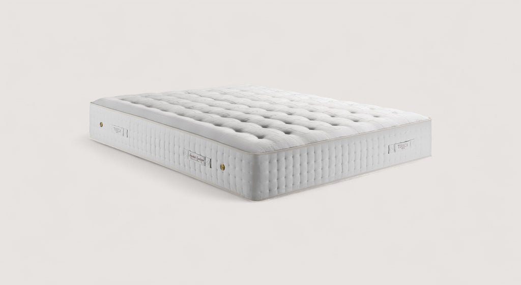 Matelas Imperial Symphonie Tresymbios, design élégant avec coutures matelassées et étiquette visible, sur un sommier gris clair